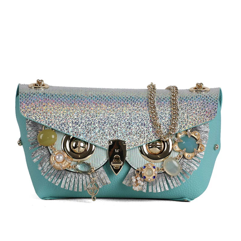 WANACCESSORY Wankou bond Zongzi Double sided cowhide owl face changing single shoulder messenger bag Original design