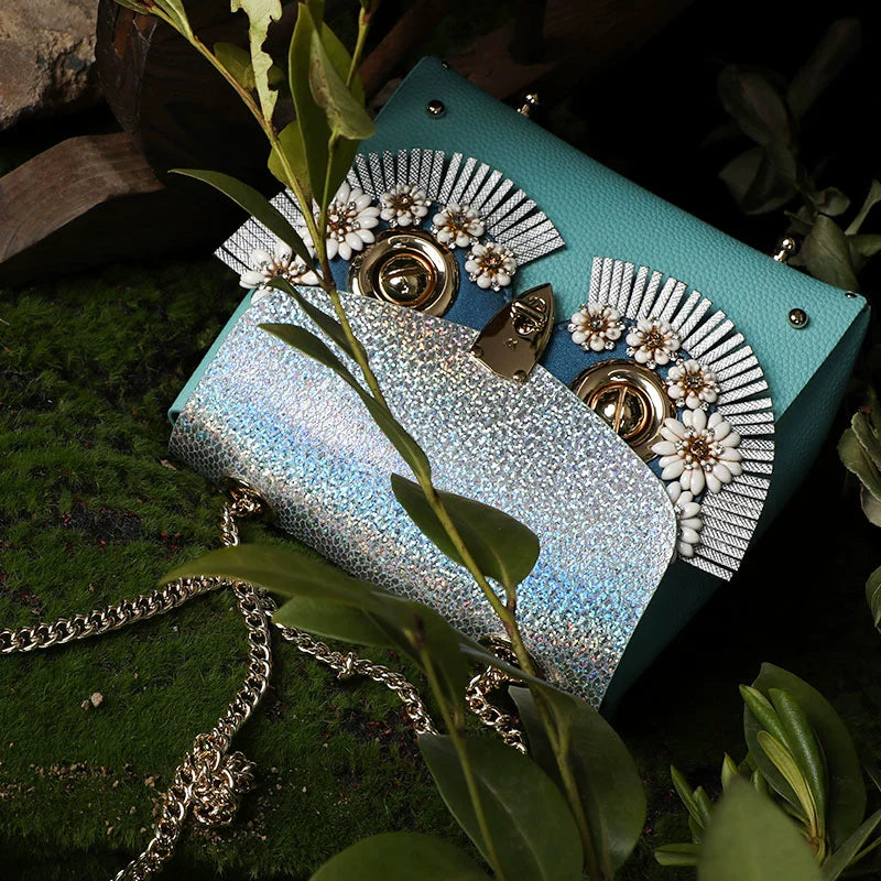 WANACCESSORY Wankou bond Zongzi Double sided cowhide owl face changing single shoulder messenger bag Original design